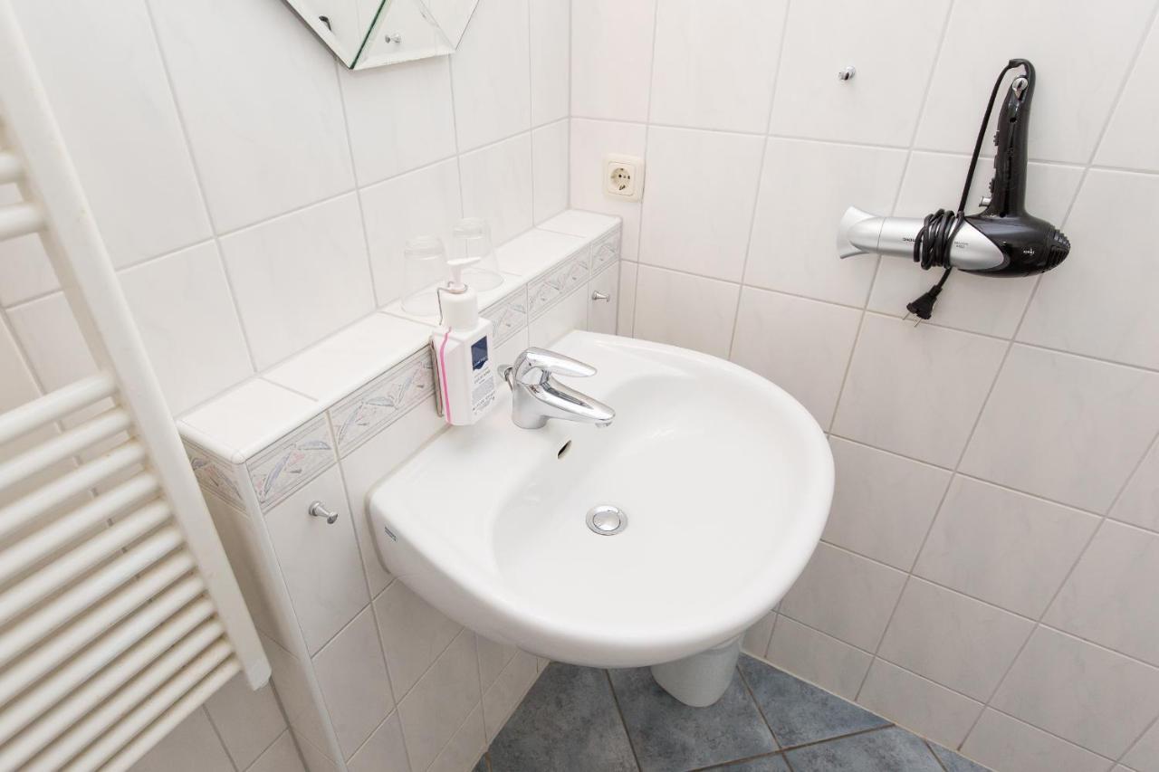 זינקסט Hotel Garni Am Deich מראה חיצוני תמונה