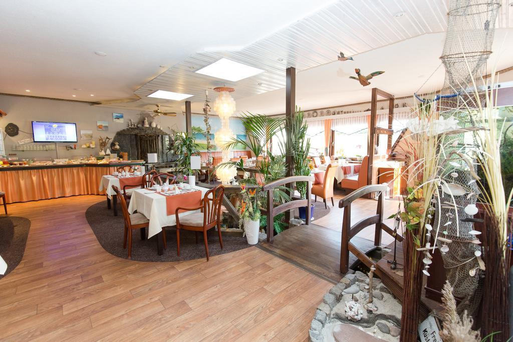 זינקסט Hotel Garni Am Deich מראה חיצוני תמונה